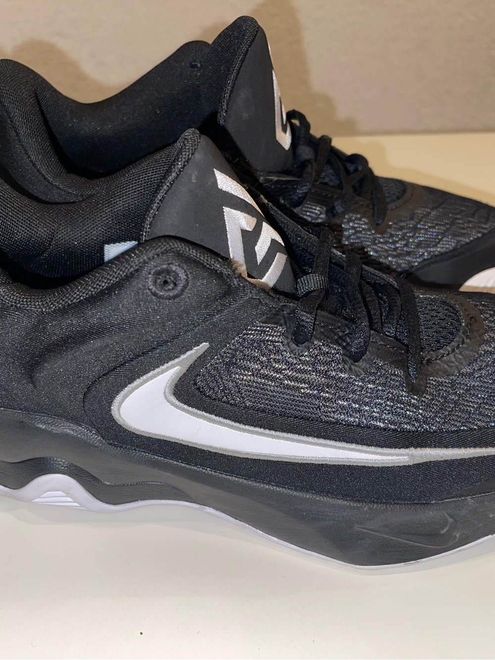 Nike Black Running Shoes with White Swoosh